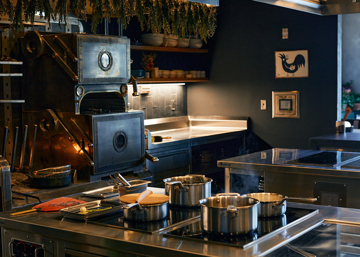 Audrey Restaurant kitchen stovetop with pots preparing food